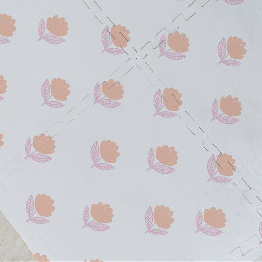 Detalhe da estampa Flora Laranja impressa diretamente no EVA — tecnologia exclusiva Tini Tiny